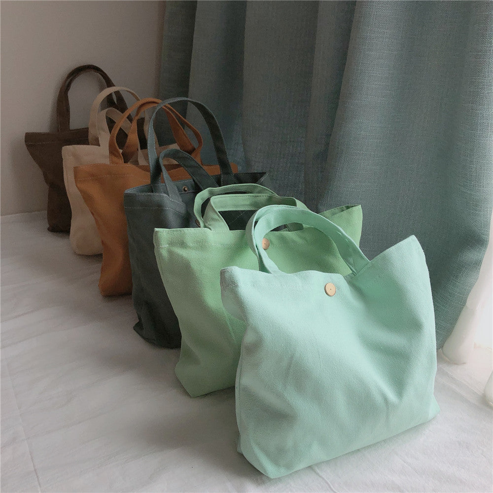 534 Solid Color Women Canvas Handbag Snap Button Simple Casual Tote Bag 534 Solid Color Women Canvas Handbag Snap Button Simple Casual Tote Bag